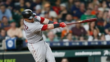 HOUSTON, TX - JUNE 02: Christian Vazquez #7 of the Boston Red Sox hits a home run in the seventh inning against the Houston Astros at Minute Maid Park on June 2, 2018 in Houston, Texas. (Photo by Bob Levey/Getty Images)