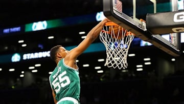 Oct 13, 2016; Brooklyn, NY, USA; Boston Celtics forward Jordan Mickey (55) dunks the ball for the game winning basket against the Brooklyn Nets during a preseason game during the second half at Barclays Center. The Celtics won 100-97. Mandatory Credit: Andy Marlin-USA TODAY Sports