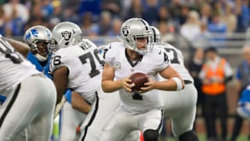 22 NOVEMBER 2015: Oakland Raiders quarterback Derek Carr (4) looks to hand the ball off during game action between the Oakland Raiders and the Detroit Lions during a regular season game played at Ford Field in Detroit, Michigan. (Photo by Scott W. Grau/Icon Sportswire) (Photo by Scott W. Grau/Icon Sportswire/Corbis via Getty Images)