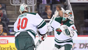 PITTSBURGH, PA - JANUARY 25: Minnesota Wild Goalie Alex Stalock (32) replaces Minnesota Wild Goalie Devan Dubnyk (40) after Dubnyk gets pulled during the second period in the NHL game between the Pittsburgh Penguins and the Minnesota Wild on January 25, 2018, at PPG Paints Arena in Pittsburgh, PA. (Photo by Jeanine Leech/Icon Sportswire via Getty Images)