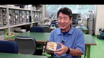 Green space Japan set to test world's first wooden satellite | REUTERS