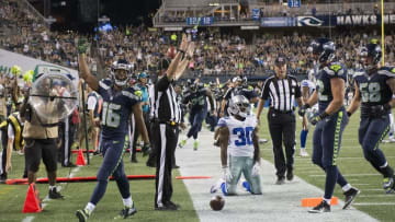 Aug 25, 2016; Seattle, WA, USA; Seattle Seahawks wide receiver Tyler Lockett (16) celebrates after scoring a touchdown during the third quarter in a preseason game against the Dallas Cowboys at CenturyLink Field. The Seahawks won 27-17. Mandatory Credit: Troy Wayrynen-USA TODAY Sports
