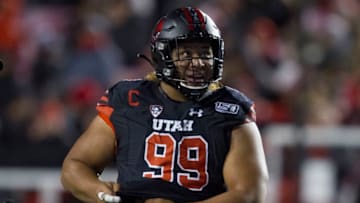 SALT LAKE CITY, UT - OCTOBER 26 : Leki Fotu #99 of the Utah Utes adjusts his pads during their game against the California Golden Bears at Rice-Eccles Stadium on October 26, 2019 in Salt Lake City, Utah. (Photo by Chris Gardner/Getty Images)