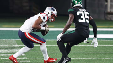 EAST RUTHERFORD, NEW JERSEY - NOVEMBER 09: Jakobi Meyers #16 of the New England Patriots makes a catch as Pierre Desir #35 of the New York Jets defends during the first half at MetLife Stadium on November 09, 2020 in East Rutherford, New Jersey. (Photo by Elsa/Getty Images)