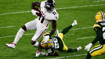 GREEN BAY, WISCONSIN - OCTOBER 05: Darnell Savage #26 of the Green Bay Packers attempts to tackle Julio Jones #11 of the Atlanta Falcons during the first half at Lambeau Field on October 05, 2020 in Green Bay, Wisconsin. (Photo by Stacy Revere/Getty Images)