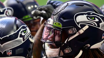 Jan 3, 2021; Glendale, Arizona, USA; Seattle Seahawks cornerback Tre Flowers (21) huddles with teammates prior to the game San Francisco 49ers at State Farm Stadium. Mandatory Credit: Joe Camporeale-USA TODAY Sports
