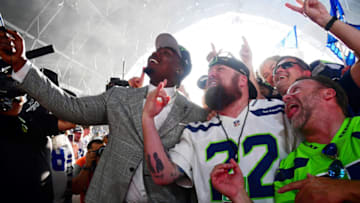 Apr 28, 2022; Las Vegas, NV, USA; Mississippi State offensive tackle Charles Cross takes a selfie with fans after being selected as the ninth overall pick to the Seattle Seahawks during the first round of the 2022 NFL Draft at the NFL Draft Theater. Mandatory Credit: Gary Vasquez-USA TODAY Sports