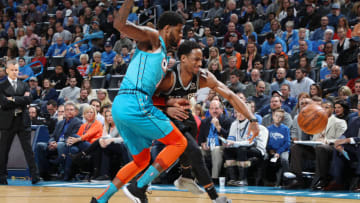 OKLAHOMA CITY, OK- JANUARY 12: Paul George #13 of the Oklahoma City Thunder and DeMar DeRozan #10 of the San Antonio Spurs battle for control of the ball during the game on January 12, 2019 at Chesapeake Energy Arena in Oklahoma City, Oklahoma. NOTE TO USER: User expressly acknowledges and agrees that, by downloading and or using this photograph, User is consenting to the terms and conditions of the Getty Images License Agreement. Mandatory Copyright Notice: Copyright 2019 NBAE (Photo by Zach Beeker/NBAE via Getty Images)