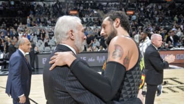SAN ANTONIO, TX - NOVEMBER 20: Marco Belinelli #3 of the Atlanta Hawks after the game with Head Coach Gregg Popovich of the San Antonio Spurs on November 20, 2017 at the AT&T Center in San Antonio, Texas. NOTE TO USER: User expressly acknowledges and agrees that, by downloading and or using this photograph, user is consenting to the terms and conditions of the Getty Images License Agreement. Mandatory Copyright Notice: Copyright 2017 NBAE (Photos by Mark Sobhani/NBAE via Getty Images)
