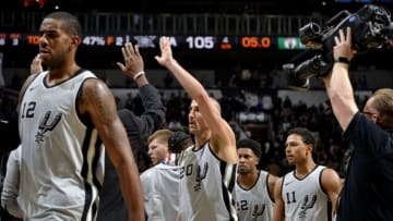 SAN ANTONIO, TX - DECEMBER 8: Manu Ginobili #20 of the San Antonio Spurs high fives his teammates after the game against the Boston Celtics on December 8, 2017 at the AT&T Center in San Antonio, Texas. NOTE TO USER: User expressly acknowledges and agrees that, by downloading and or using this photograph, user is consenting to the terms and conditions of the Getty Images License Agreement. Mandatory Copyright Notice: Copyright 2017 NBAE (Photos by Mark Sobhani/NBAE via Getty Images)