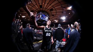 NEW YORK, NY - JANUARY 2: Manu Ginobili #20 of the San Antonio Spurs high fives as a fan as he exits the arena after the game against the New York Knicks on January 2, 2018 at Madison Square Garden in New York, New York. NOTE TO USER: User expressly acknowledges and agrees that, by downloading and or using this Photograph, user is consenting to the terms and conditions of the Getty Images License Agreement. Mandatory Copyright Notice: Copyright 2018 NBAE (Photo by Nathaniel S. Butler/NBAE via Getty Images)