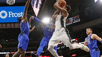SAN ANTONIO,TX - OCTOBER 29: DeMar DeRozan #10 of the San Antonio Spurs scores past Dallas Mavericks at AT&T Center on October 29 , 2018 in San Antonio, Texas. NOTE TO USER: User expressly acknowledges and agrees that , by downloading and or using this photograph, User is consenting to the terms and conditions of the Getty Images License Agreement. (Photo by Ronald Cortes/Getty Images)