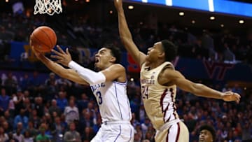Mar 16, 2019; Charlotte, NC, USA; Duke Blue Devils guard Tre Jones (3) shoots the ball against Florida State Seminoles guard Devin Vassell (24) in the second half in the ACC conference tournament at Spectrum Center. Mandatory Credit: Jeremy Brevard-USA TODAY Sports