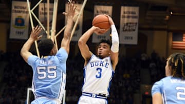 Mar 7, 2020; Durham, North Carolina, USA; San Antonio Spurs draft pick Tre Jones (3) shoots over North Carolina Tar Heels guard Christian Keeling (55) during the second half at Cameron Indoor Stadium. (Rob Kinnan-USA TODAY Sports)
