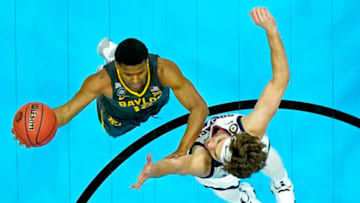 Apr 5, 2021; Indianapolis, IN, USA; Baylor Bears guard Jared Butler (12) shoots the ball the ball against Gonzaga Bulldogs forward Corey Kispert (24) during the first half in the national championship game during the Final Four of the 2021 NCAA Tournament at Lucas Oil Stadium. Mandatory Credit: Kyle Terada-USA TODAY Sports