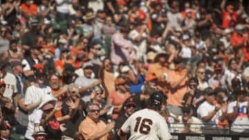 Oct 4, 2015; San Francisco, CA, USA; The San Francisco Giants fans cheer for center fielder Angel Pagan (16) after he scored against the Colorado Rockies during the first inning at AT&T Park. Mandatory Credit: Ed Szczepanski-USA TODAY Sports