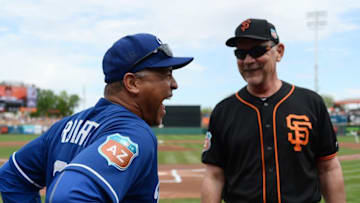 Mar 6, 2016; Scottsdale, AZ, USA; Los Angeles Dodgers manager Dave Roberts (30) and San Francisco Giants manager Bruce Bochy (15) talk prior to the game at Scottsdale Stadium. Mandatory Credit: Joe Camporeale-USA TODAY Sports
