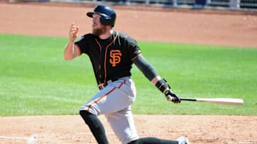 Mar 16, 2016; Peoria, AZ, USA; San Francisco Giants right fielder Hunter Pence (8) singles in the second inning against the Seattle Mariners at Peoria Sports Complex. Mandatory Credit: Matt Kartozian-USA TODAY Sports