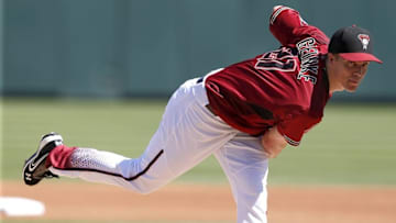 Mar 4, 2016; Salt River Pima-Maricopa, AZ, USA; Arizona Diamondbacks starting pitcher Zack Greinke (21) throws in the first inning during a spring training game against the Oakland Athletics at Salt River Fields at Talking Stick. Mandatory Credit: Rick Scuteri-USA TODAY Sports
