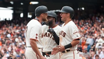 Apr 7, 2016; San Francisco, CA, USA; San Francisco Giants right fielder Hunter Pence (8) celebrates with center fielder Denard Span (2) and second baseman Joe Panik (12) after hitting a grand slam against the San Francisco Giants during the eighth inning at AT&T Park. The Giants won 12-6. Mandatory Credit: Ed Szczepanski-USA TODAY Sports