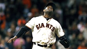 Apr 18, 2016; San Francisco, CA, USA; San Francisco Giants closing pitcher Santiago Casilla (46) watches as a solo home hit by Arizona Diamondbacks Third baseman Jake Lamb (not pictured) goes over the right field wall to tie-up the game 7-7 in the ninth inning at AT&T Park. Mandatory Credit: Lance Iversen-USA TODAY Sports