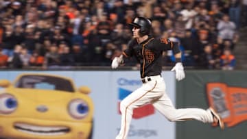 May 6, 2016; San Francisco, CA, USA; San Francisco Giants third baseman Matt Duffy (5) runs to third base after hitting a triple against the Colorado Rockies during the fifth inning at AT&T Park. The San Francisco Giants defeated the Colorado Rockies 6-4. Mandatory Credit: Ed Szczepanski-USA TODAY Sports