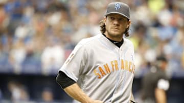 Jun 19, 2016; St. Petersburg, FL, USA; San Francisco Giants starting pitcher Jake Peavy (22) walk back to the dugout at the end of the first inning against the Tampa Bay Rays at Tropicana Field. Mandatory Credit: Kim Klement-USA TODAY Sports