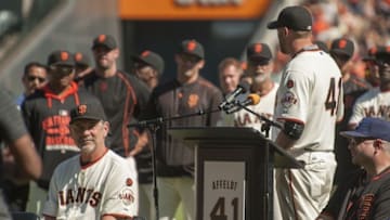 Oct 4, 2015; San Francisco, CA, USA; San Francisco Giants relief pitcher Jeremy Affeldt (41) speaks to manager Bruce Bochy (15) during his retirement speech before the game against the Colorado Rockies at AT&T Park. Mandatory Credit: Ed Szczepanski-USA TODAY Sports