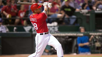 May 2, 2015; Arlington, TX, USA; Texas Rangers first baseman Kyle Blanks (88) hits a home run against the Oakland Athletics during the game at Globe Life Park in Arlington. The Rangers defeated the Athletics 8-7. Mandatory Credit: Jerome Miron-USA TODAY Sports