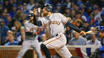 Oct 8, 2016; Chicago, IL, USA; San Francisco Giants right fielder Hunter Pence (8) hits a single against the Chicago Cubs during the second inning during game two of the 2016 NLDS playoff baseball series at Wrigley Field. Mandatory Credit: Jerry Lai-USA TODAY Sports