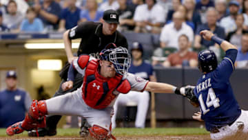 MILWAUKEE, WI - JULY 23: Matt Wieters #32 of the Washington Nationals tags out Hernan Perez #14 of the Milwaukee Brewers at home plate in the fourth inning at Miller Park on July 23, 2018 in Milwaukee, Wisconsin. (Photo by Dylan Buell/Getty Images)