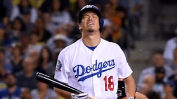 LOS ANGELES, CA - AUGUST 15: Kenta Maeda #18 of the Los Angeles Dodgers reacts to the second strike, in his pinch hit at bat, to go 0-2 in the count during the ninth inning against the San Francisco Giants at Dodger Stadium on August 15, 2018 in Los Angeles, California. (Photo by Harry How/Getty Images)
