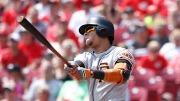 CINCINNATI, OH - AUGUST 19: Gorkys Hernandez #7 of the San Francisco Giants hits a sacrifice fly to drive in a run in the second inning against the Cincinnati Reds at Great American Ball Park on August 19, 2018 in Cincinnati, Ohio. (Photo by Joe Robbins/Getty Images)