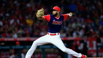 ANAHEIM, CA - AUGUST 25: Williams Jerez #36 of the Los Angeles Angels of Anaheim pitches during the eighth inning of a game against the Houston Astros at Angel Stadium on August 25, 2018 in Anaheim, California. All players across MLB will wear nicknames on their backs as well as colorful, non-traditional uniforms featuring alternate designs inspired by youth-league uniforms during Players Weekend. (Photo by Sean M. Haffey/Getty Images)