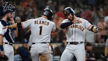 SAN DIEGO, CA - SEPTEMBER 17: Evan Longoria #10 of the San Francisco Giants, right, celebrates with Gregor Blanco #1 after hitting a two-run home run during the fifth inning of a baseball game against the San Diego Padres at PETCO Park on September 17, 2018 in San Diego, California. (Photo by Denis Poroy/Getty Images)