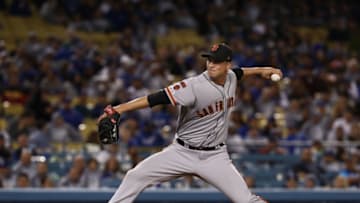 LOS ANGELES, CALIFORNIA - APRIL 03: Pitcher Tony Watson #56 of the San Francisco Giants pitches in the eighth inning of the MLB game against the Los Angeles Dodgers at Dodger Stadium on April 03, 2019 in Los Angeles, California. The Dodgers defeated the Giants 5-3. (Photo by Victor Decolongon/Getty Images)