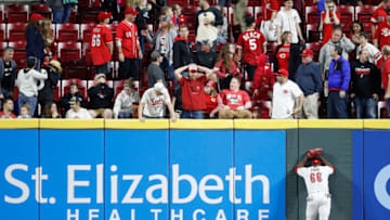 CINCINNATI, OH - MAY 03: Yasiel Puig #66 of the Cincinnati Reds reacts after a solo home run by Stephen Vogt #21 of the San Francisco Giants to tie the game in the ninth inning at Great American Ball Park on May 3, 2019 in Cincinnati, Ohio. The Giants won 12-11 in 11 innings. (Photo by Joe Robbins/Getty Images)