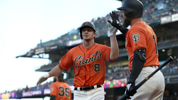 SAN FRANCISCO, CALIFORNIA - JUNE 28: Alex Dickerson #8 of the San Francisco Giants is congratulated by Kevin Pillar #1 after he hit a home run in the second inning against the Arizona Diamondbacks at Oracle Park on June 28, 2019 in San Francisco, California. (Photo by Ezra Shaw/Getty Images)