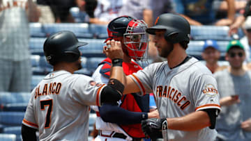 ATLANTA, GA - JUNE 02: Madison Bumgarner #40 of the San Francisco Giants reacts after hitting a two-run homer in the fifth inning against the Atlanta Braves that also scored Gregor Blanco #7 at Turner Field on June 2, 2016 in Atlanta, Georgia. (Photo by Kevin C. Cox/Getty Images)