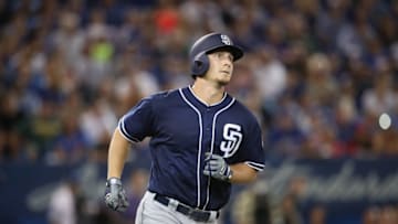 TORONTO, CANADA - JULY 25: Alex Dickerson #1 of the San Diego Padres watches the flight of his two-run home run that would land in the fifth deck in the ninth inning during MLB game action against the Toronto Blue Jays on July 25, 2016 at Rogers Centre in Toronto, Ontario, Canada. (Photo by Tom Szczerbowski/Getty Images)