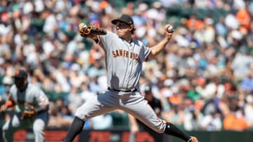 SEATTLE, WA - JULY 25: Starter Derek Holland #45 of the San Francisco Giants delivers a pitch during the first inning of a game against the Seattle Mariners at Safeco Field on July 25, 2018 in Seattle, Washington. (Photo by Stephen Brashear/Getty Images)