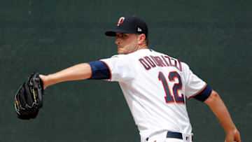 FORT MYERS, FLORIDA - FEBRUARY 26: Jake Odorizzi #12 of the Minnesota Twins warms up prior to the game against the Philadelphia Phillies at Hammond Stadium on February 26, 2020 in Fort Myers, Florida. (Photo by Michael Reaves/Getty Images)