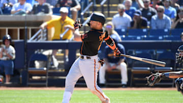 MARYVALE, ARIZONA - MARCH 06: Yolmer Sanchez #2 of the San Francisco Giants follows though on a swing against the Milwaukee Brewers during a spring training game at American Family Fields of Phoenix on March 06, 2020 in Maryvale, Arizona. (Photo by Norm Hall/Getty Images)