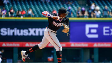 DENVER, CO - JULY 11: Marco Luciano #10 of National League Futures Team throws a ball as he warms up before a game against the American League Futures Team at Coors Field on July 11, 2021 in Denver, Colorado. Luciano is in the SF Giants organization. (Photo by Dustin Bradford/Getty Images)