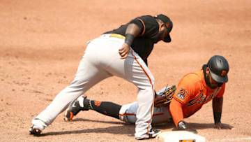 SAN FRANCISCO, CALIFORNIA - JULY 15: Heliot Ramos of the San Francisco Giants slides safely back in to first base that is covered by Pablo Sandoval #48 during an intrasquad game at Oracle Park on July 15, 2020 in San Francisco, California. (Photo by Ezra Shaw/Getty Images)