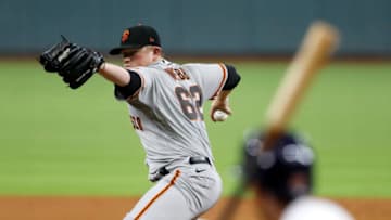 HOUSTON, TEXAS - AUGUST 10: Logan Webb #62 of the San Francisco Giants pitches in the second inning against the Houston Astros at Minute Maid Park on August 10, 2020 in Houston, Texas. (Photo by Tim Warner/Getty Images)