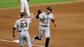 Hunter Pence #8 of the SF Giants rounds third after a three-run home run in the seventh inning against the Houston Astros at Minute Maid Park on August 11, 2020 in Houston, Texas. (Photo by Tim Warner/Getty Images)