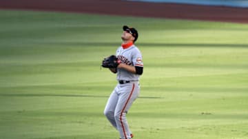 LOS ANGELES, CA - AUGUST 8: Austin Slater #13 of the San Francisco Giants plays right field during the game against the Los Angeles Dodgers at Dodger Stadium on August 8, 2020 in Los Angeles, California. The Giants defeated the Dodgers 5-4. (Photo by Rob Leiter/MLB Photos via Getty Images)