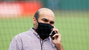SAN FRANCISCO, CALIFORNIA - AUGUST 26: President of Baseball Operations Farhan Zaidi of the San Francisco Giants talks on the phone before the postponement of the game against the Los Angeles Dodgers at Oracle Park on August 26, 2020 in San Francisco, California. Several sporting leagues across the nation today are postponing their schedules as players protest the shooting of Jacob Blake by Kenosha, Wisconsin police. (Photo by Lachlan Cunningham/Getty Images)