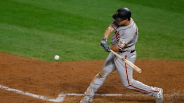 Alex Dickerson #12 of the SF Giants bats during the fifth inning against the Colorado Rockies at Coors Field on September 1, 2020. (Photo by Justin Edmonds/Getty Images)